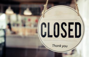 Closed. coffee cafe shop text on vintage sign board hanging on glass door in modern cafe shop reopen after coronavirus quarantine is over in restaurant ready to service, small business owner concept