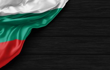 Close Up of Bulgarian flag on the black wooden background 3D render