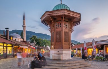 Bascarsija square with Sebilj wooden fountain in Old Town Sarajevo in Bosnia and Herzegovina. Long exposure shot